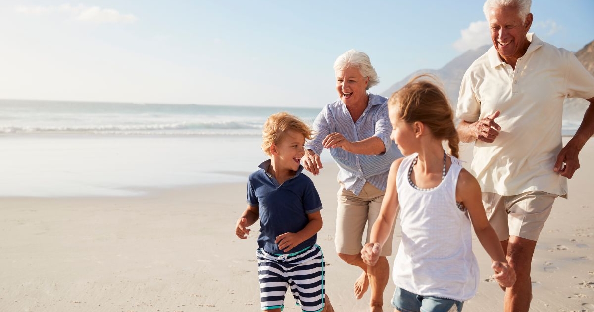 Image of grandparents playing with kids