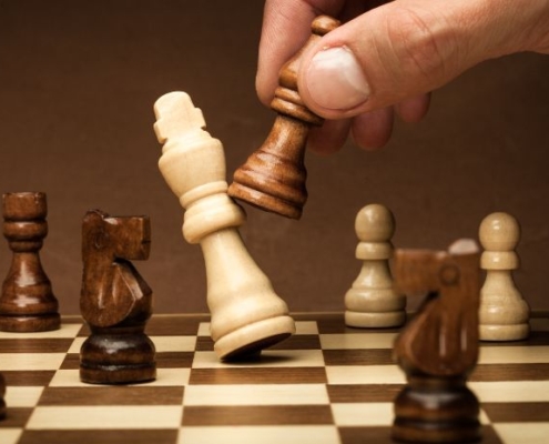 Image of a man playing chess